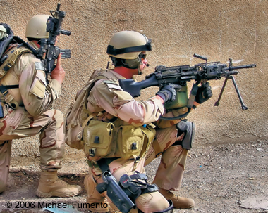 Navy Petty Officer 2nd Class (Sea, Air, and Land) Michael Monsoor in combat in Ramadi, 2006.